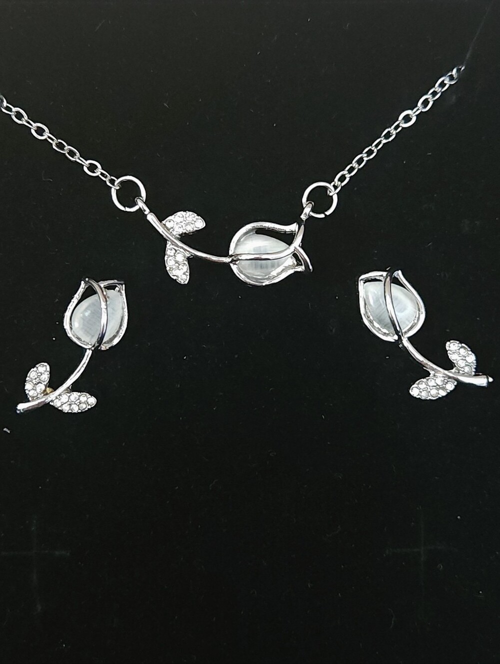 Silver And White Crystal Rose Necklace and Earrings Set